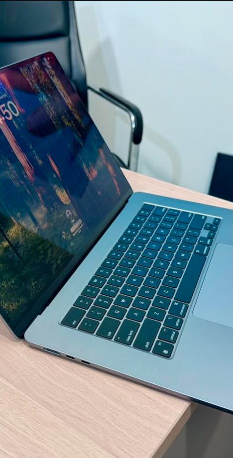 newly repaird imac on a table with an open screen