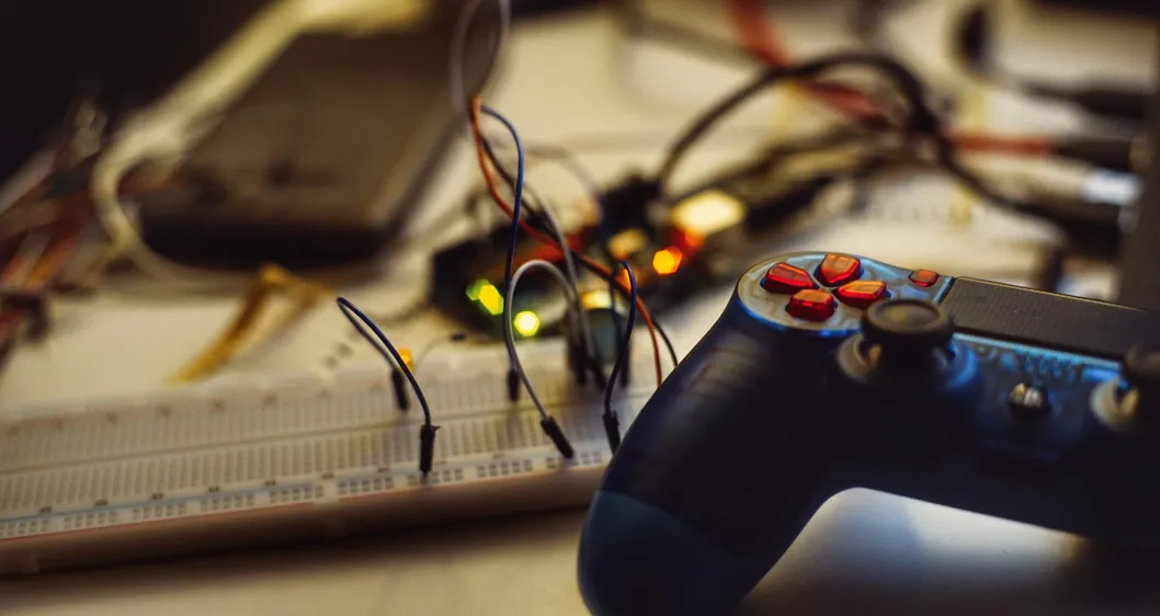 gaming controller and wires on a desk